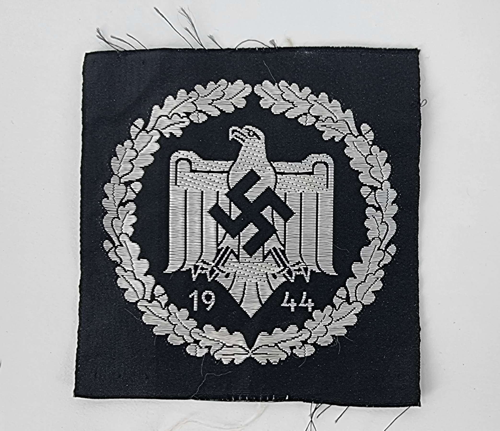 WWII German NSRL/DRL Sports Silver Badge Dated 1944